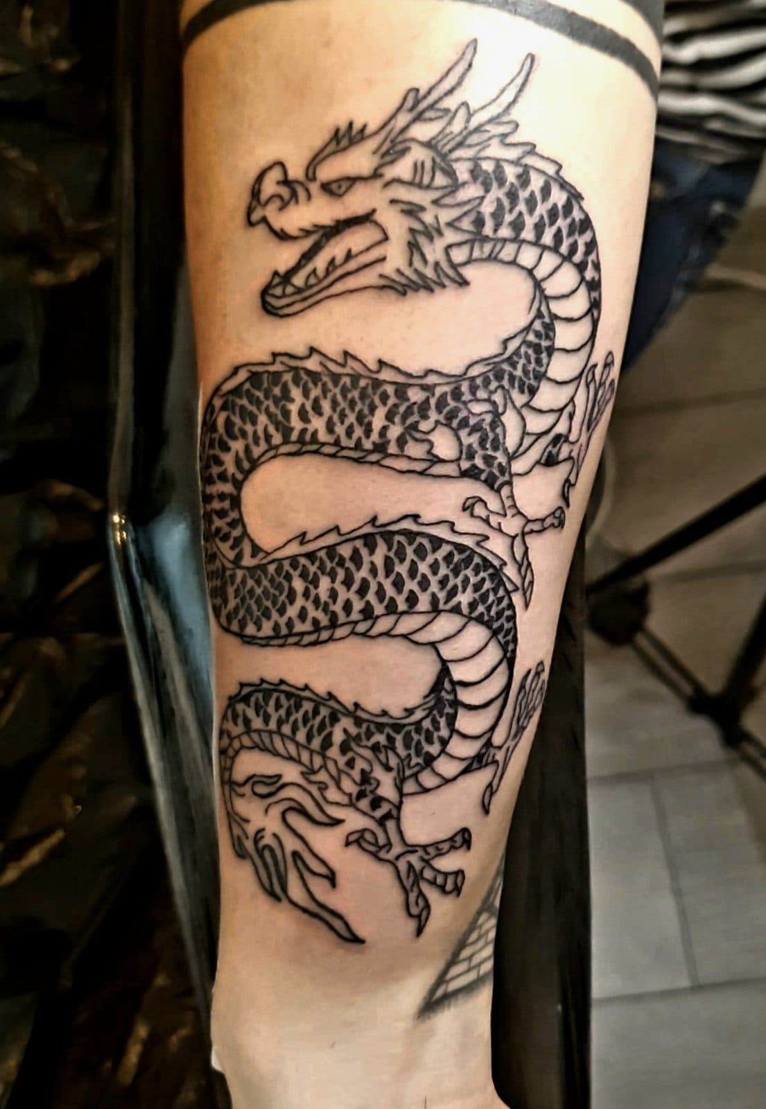 Tatuaj dragon pe antebraț